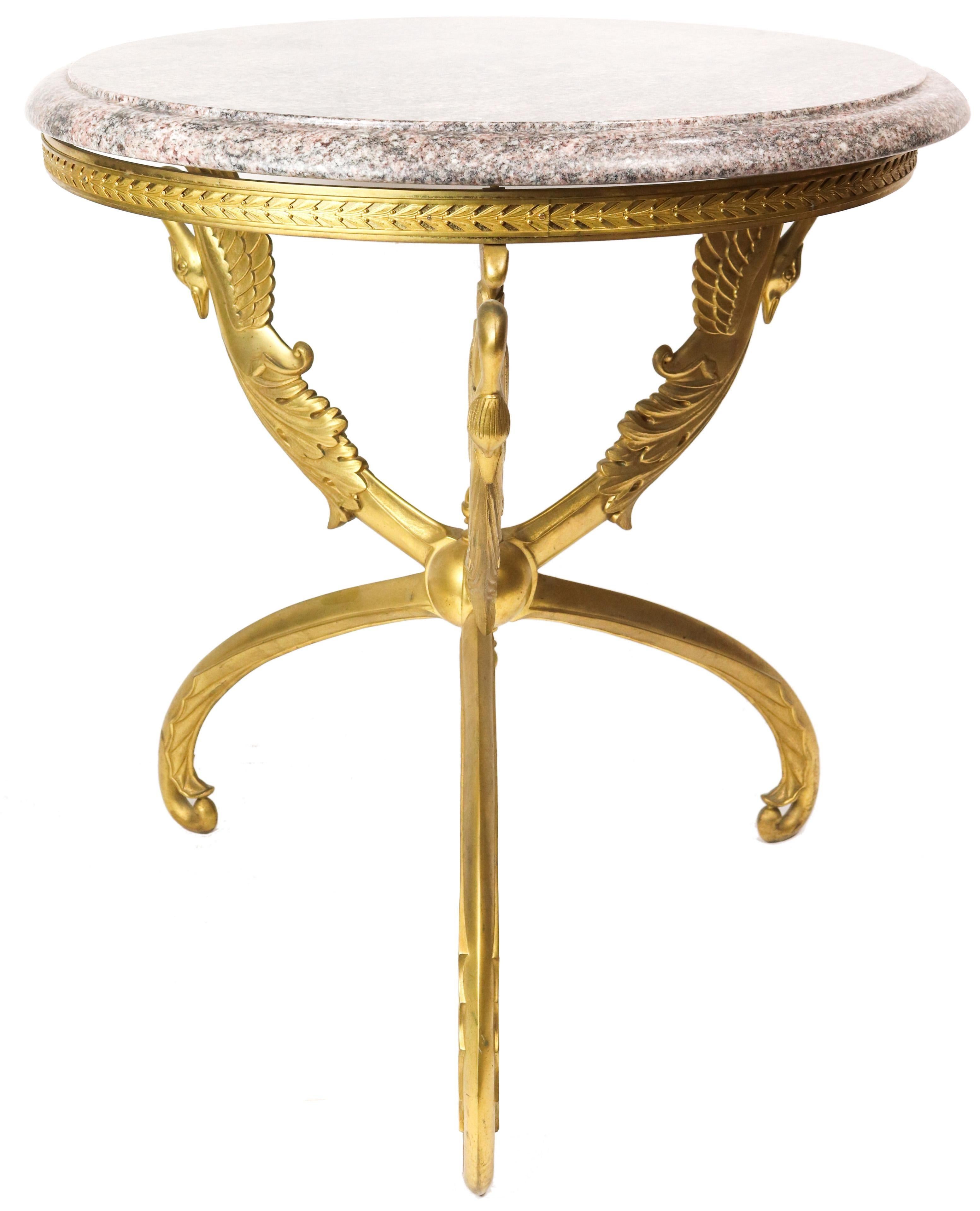 Very finely cast Empire style gilt bronze gueridon table with swan motif.