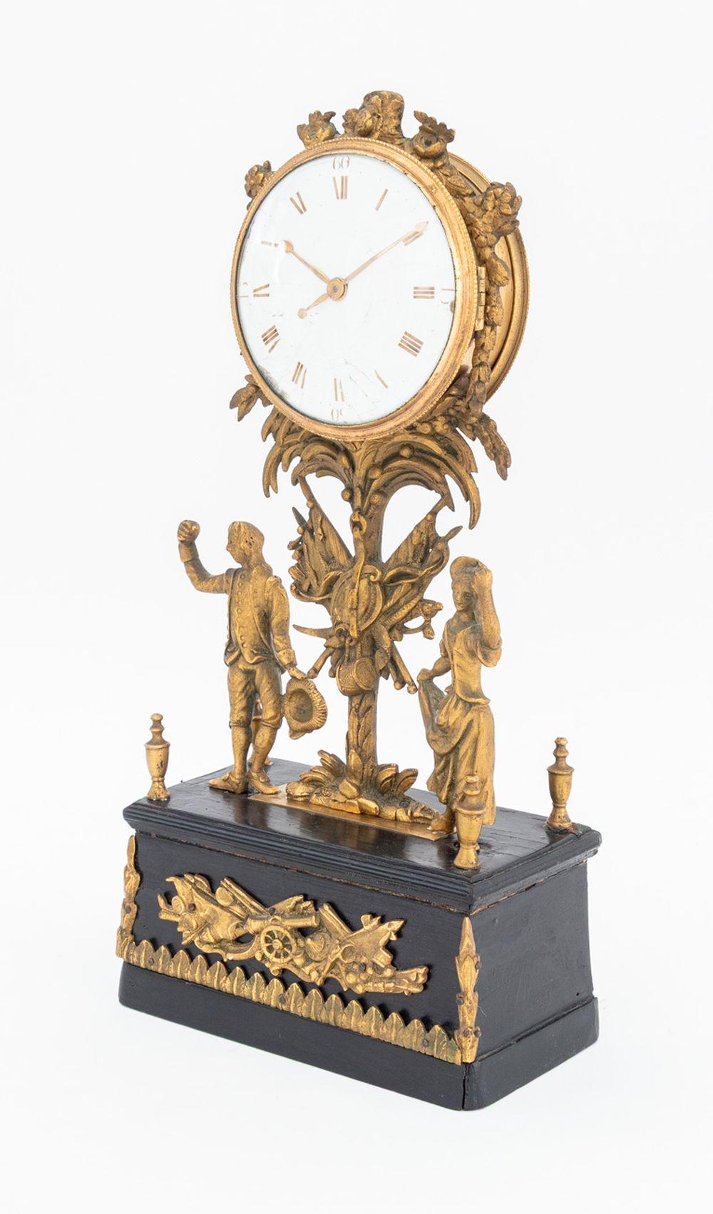 Empire Style Gilt Metal Ebonized Mantle Clock In Good Condition For Sale In Astoria, NY