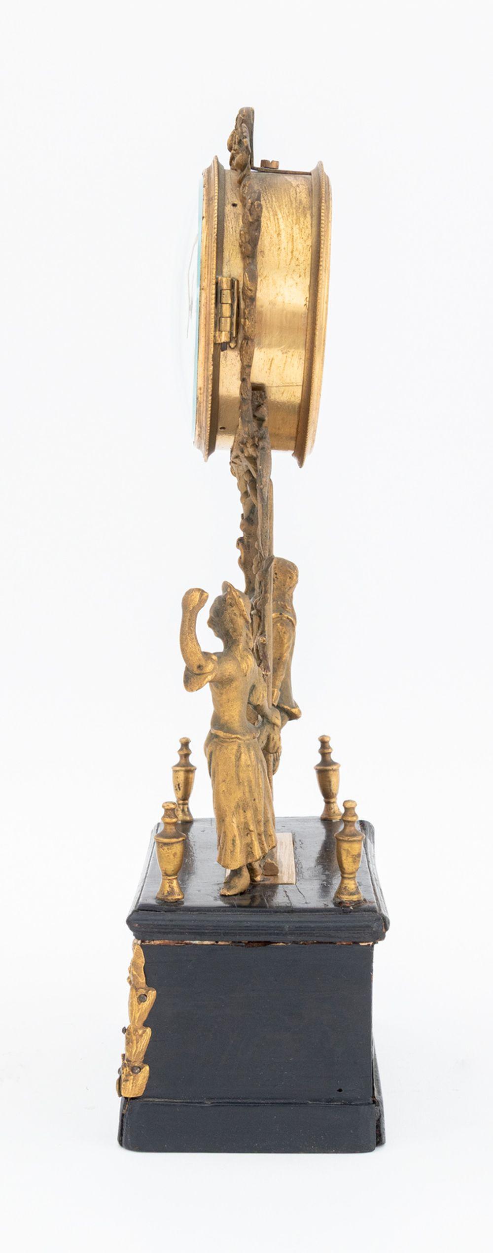 19th Century Empire Style Gilt Metal Ebonized Mantle Clock For Sale
