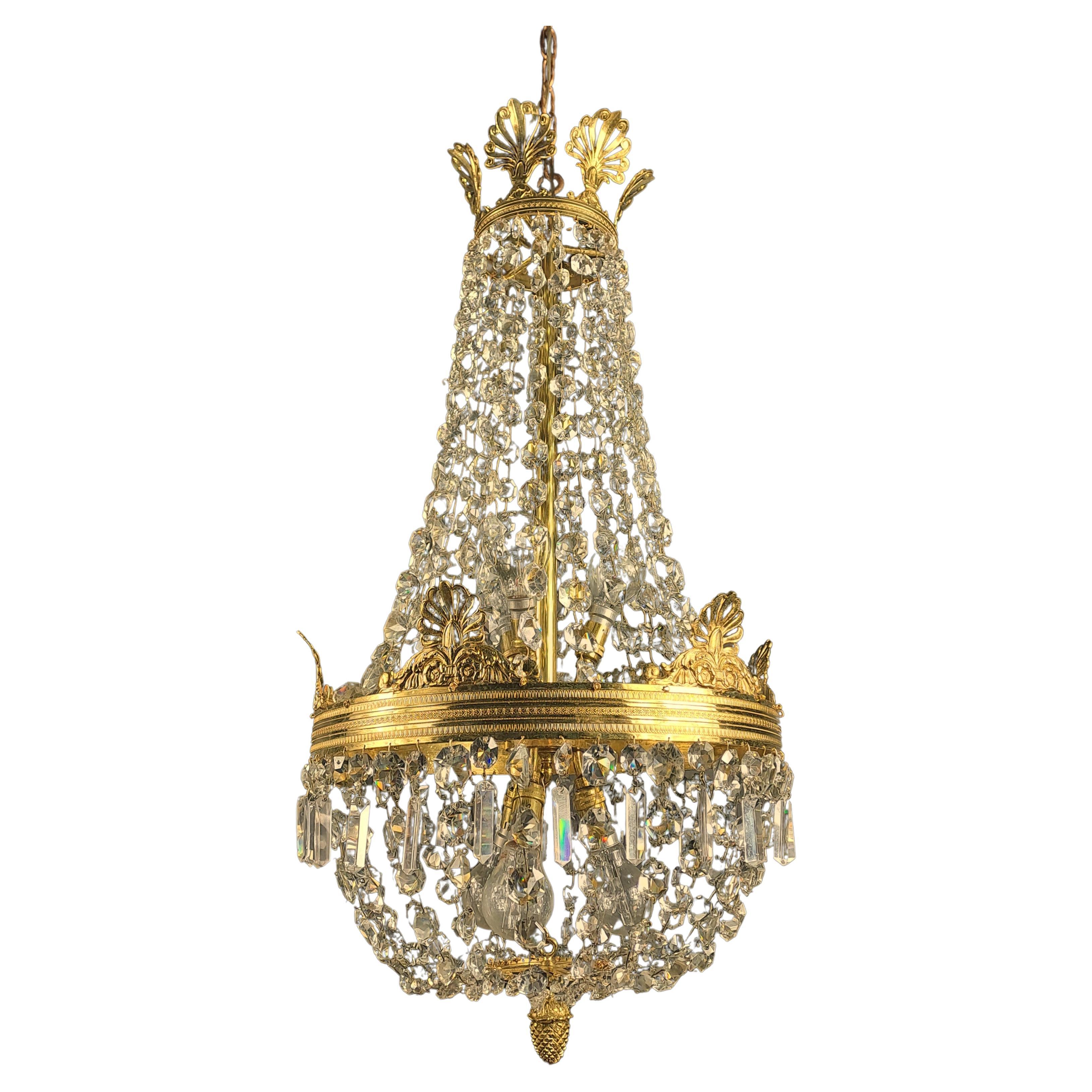 Lustre de style Empire en bronze doré et cristal