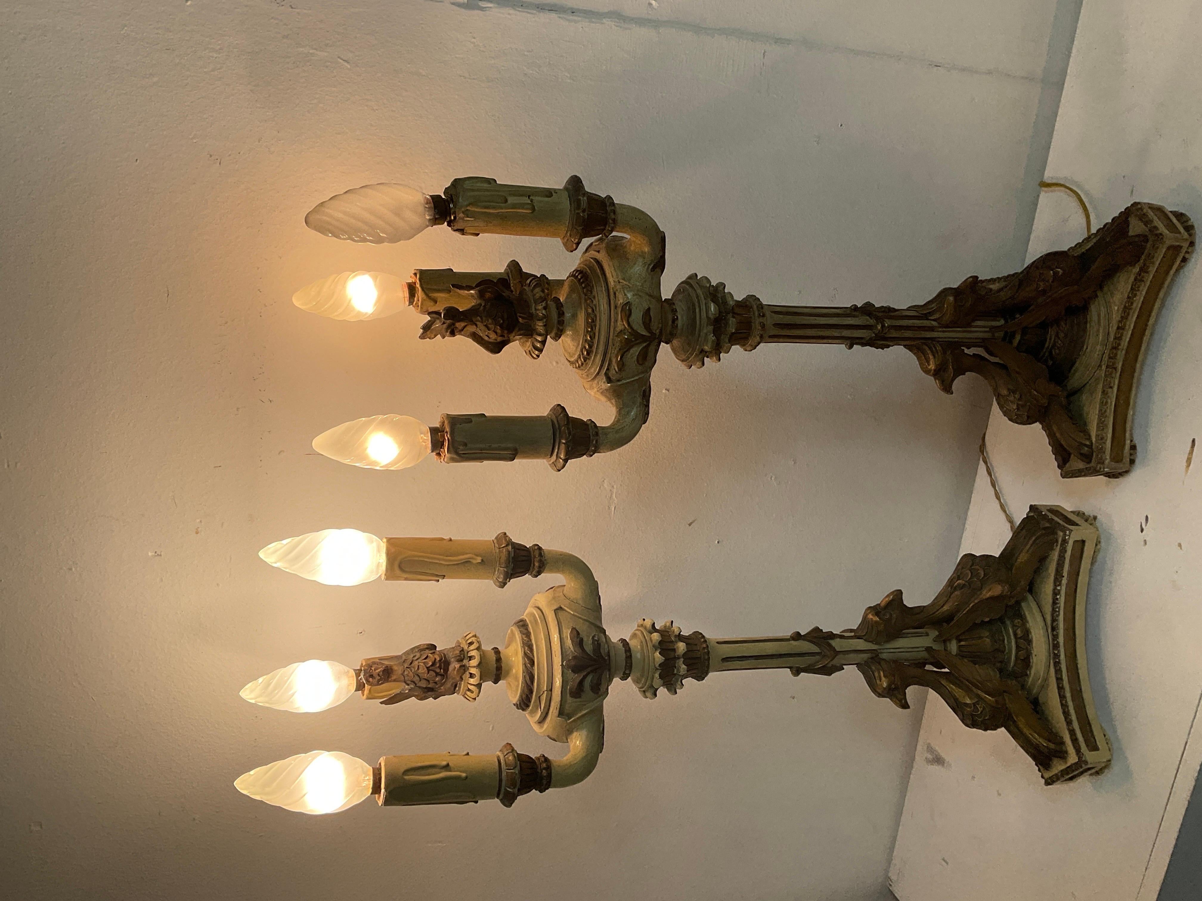 French Empire-style lacquered and gilded wood candlesticks from the late 1800s For Sale