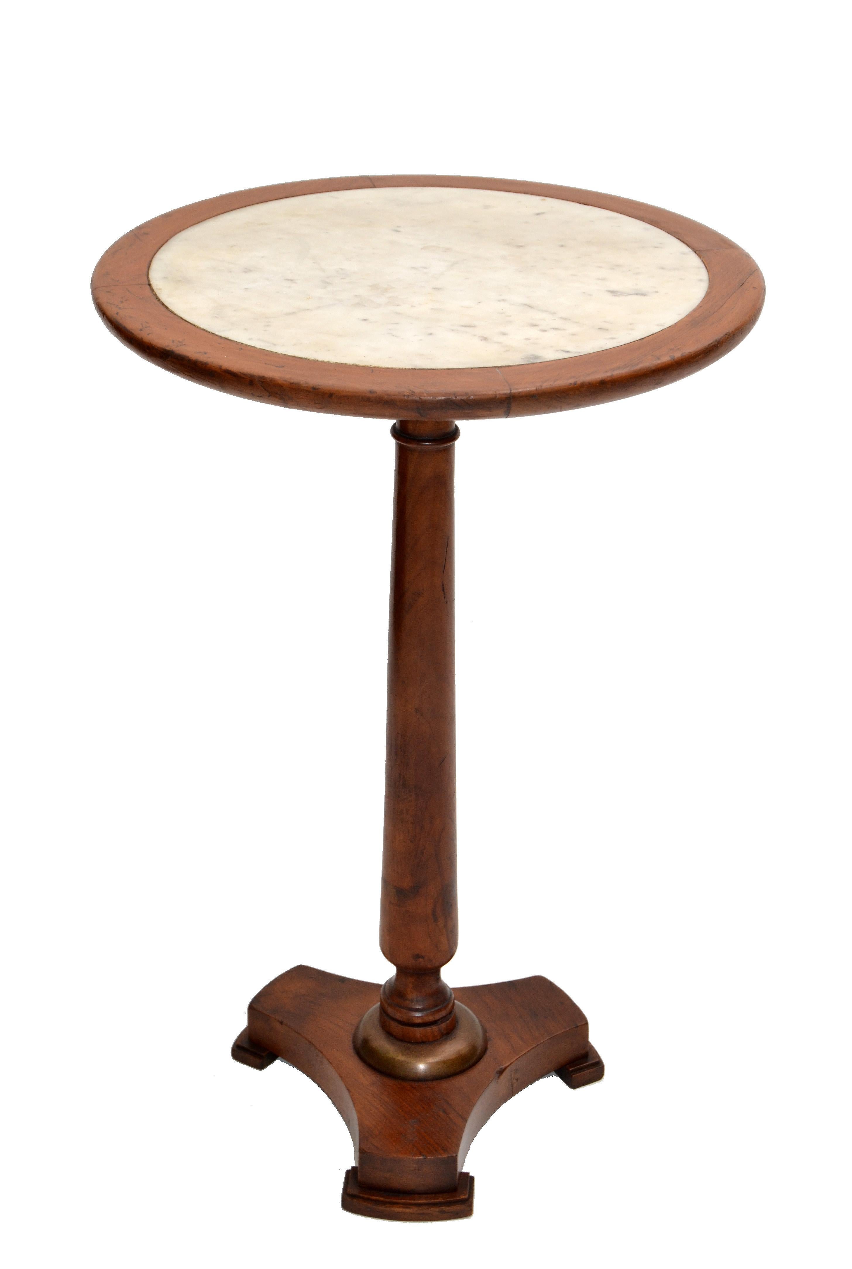We offer an Empire style side table made in France.
Turned oak wood pedestal stand with Marble Top from the late 1950s.
Stamped underneath, Made in France.