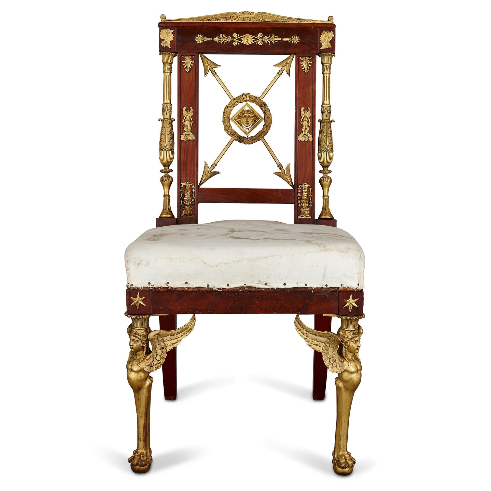 Empire style mahogany and gilt bronze side chair
French, late 19th century
Measures: Height 94cm, width 52cm, depth 52cm

Crafted from mahogany, this unusual side chair is mounted throughout with Empire style gilt bronze mounts, referencing both