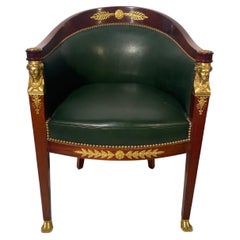 Empire style mahogany and leather desk chair with Egyptian decor