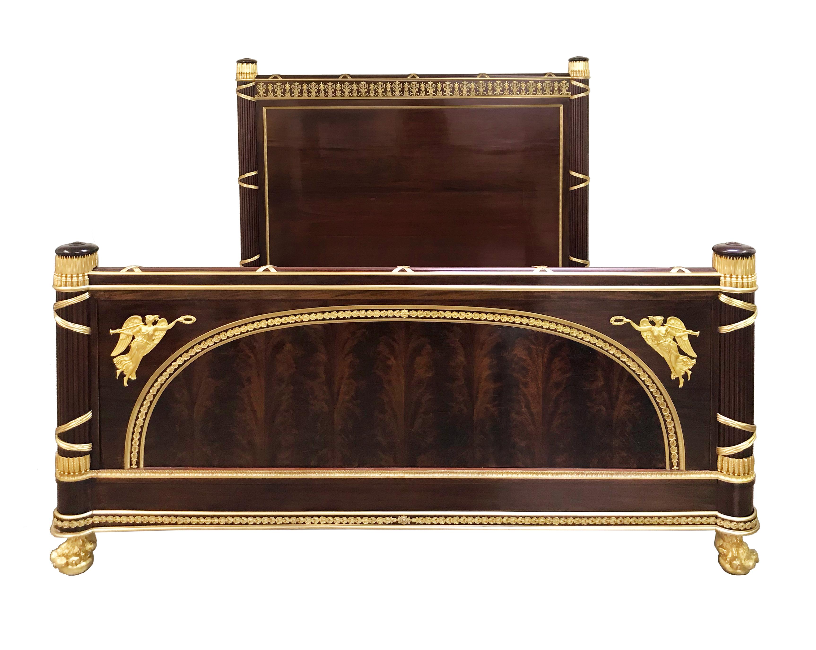Empire style mahogany and ormolu king size bed by Joseph-Emmanuel Zwiener
circa Last quarter of the 19th century.
Fine gilded bronzes with two tones of gilding, neoclassical Empire style motifs throughout the design, the four posts resembling