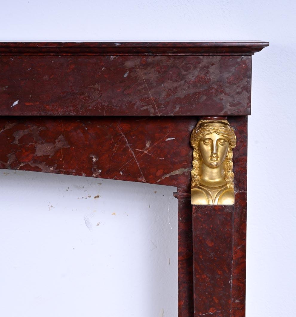 Griotte Marble Empire style mantel in Rouge Griotte marble, bronzes ( attributed to Thomire ) For Sale