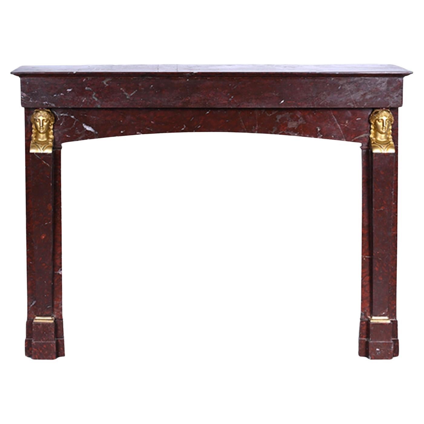Cheminée de style Empire en marbre Rouge Griotte, bronzes ( attribuée à Thomire)
