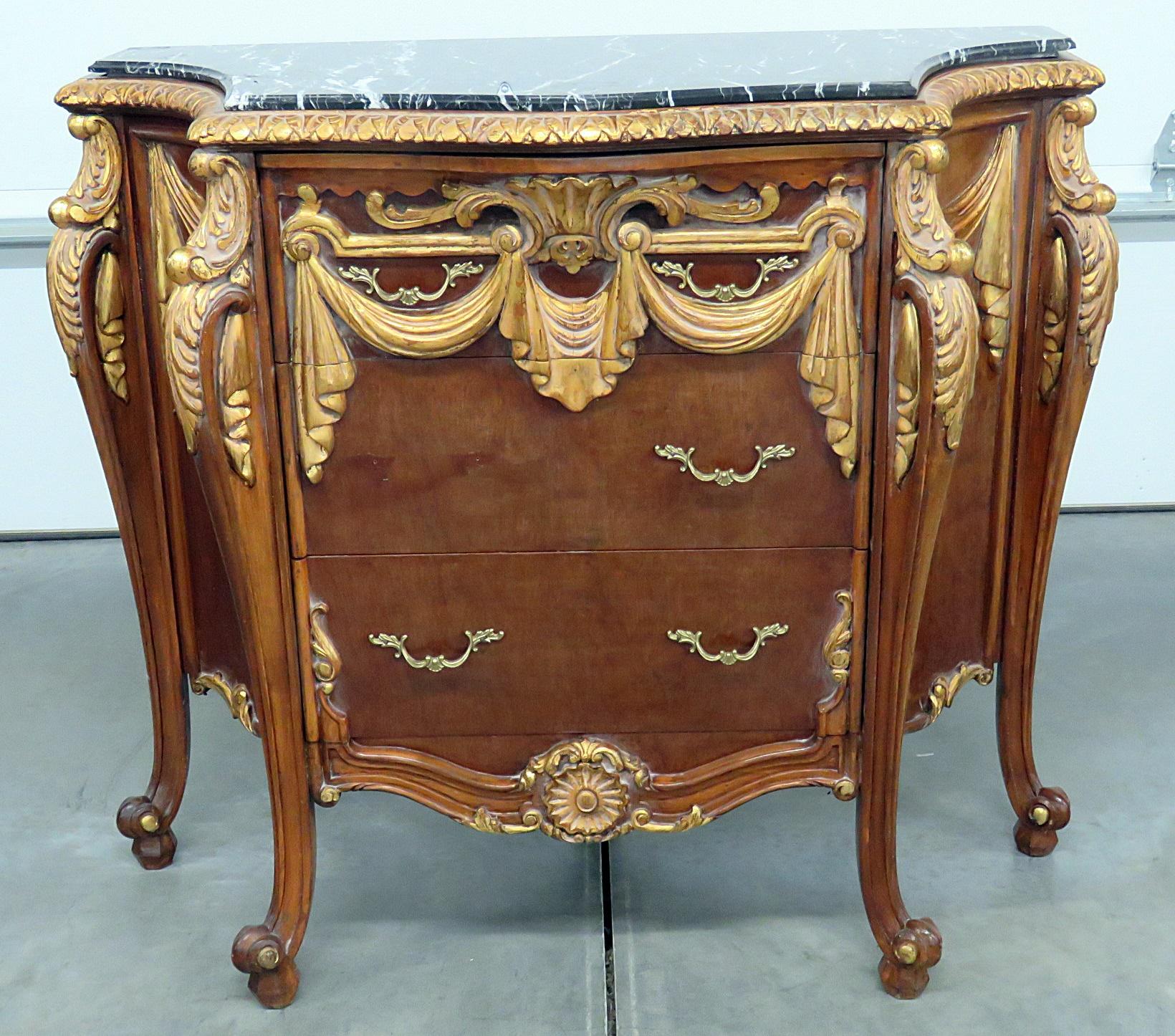 Empire style marble top 2-drawer commode with gilt accents.