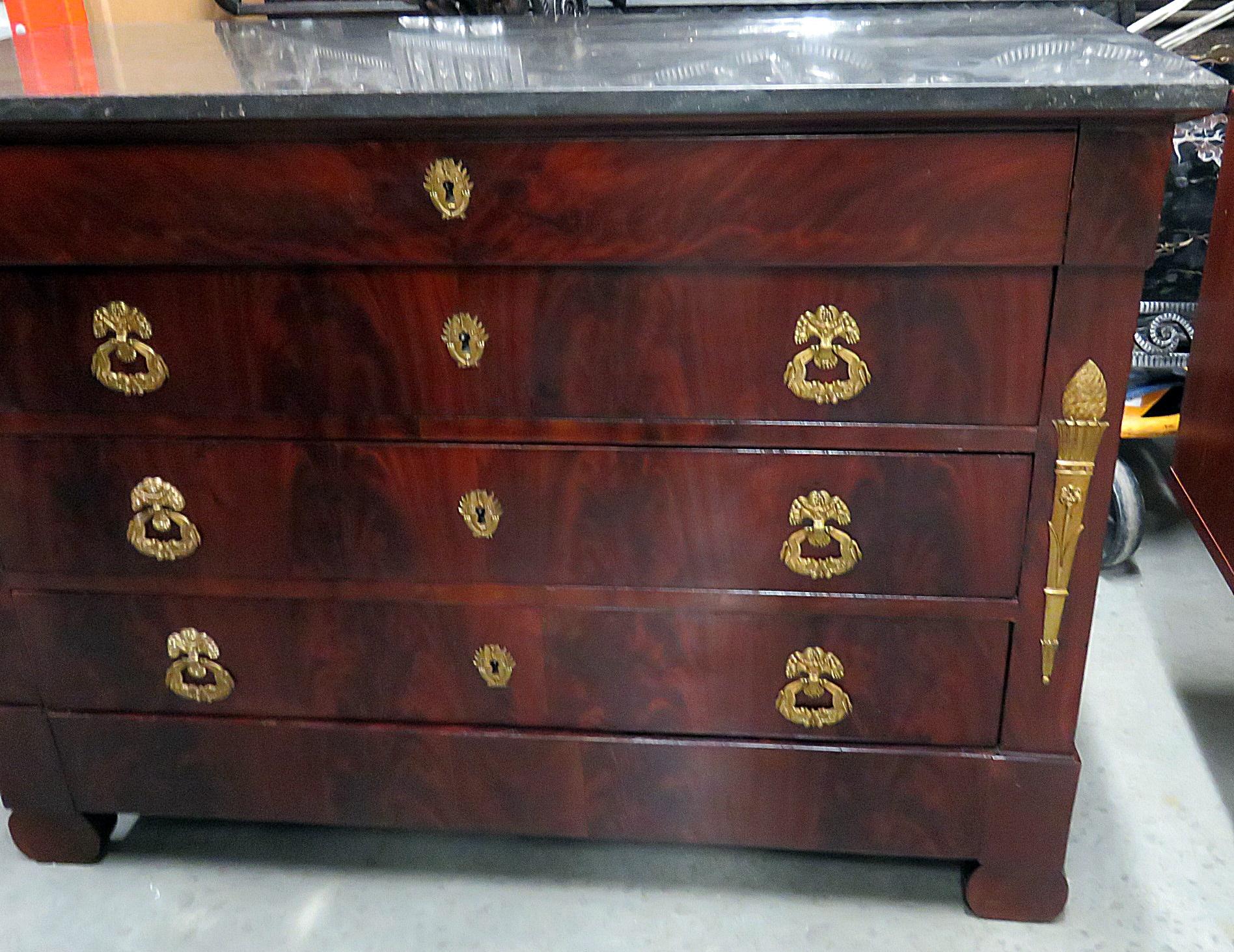 This is a superb bronze mounted French Empire 4-drawer marble-top commode with bronze mounts and dates to the 1880s. It may even be older. The bronze ormolu mounts are in superb condition and expertly cast. 