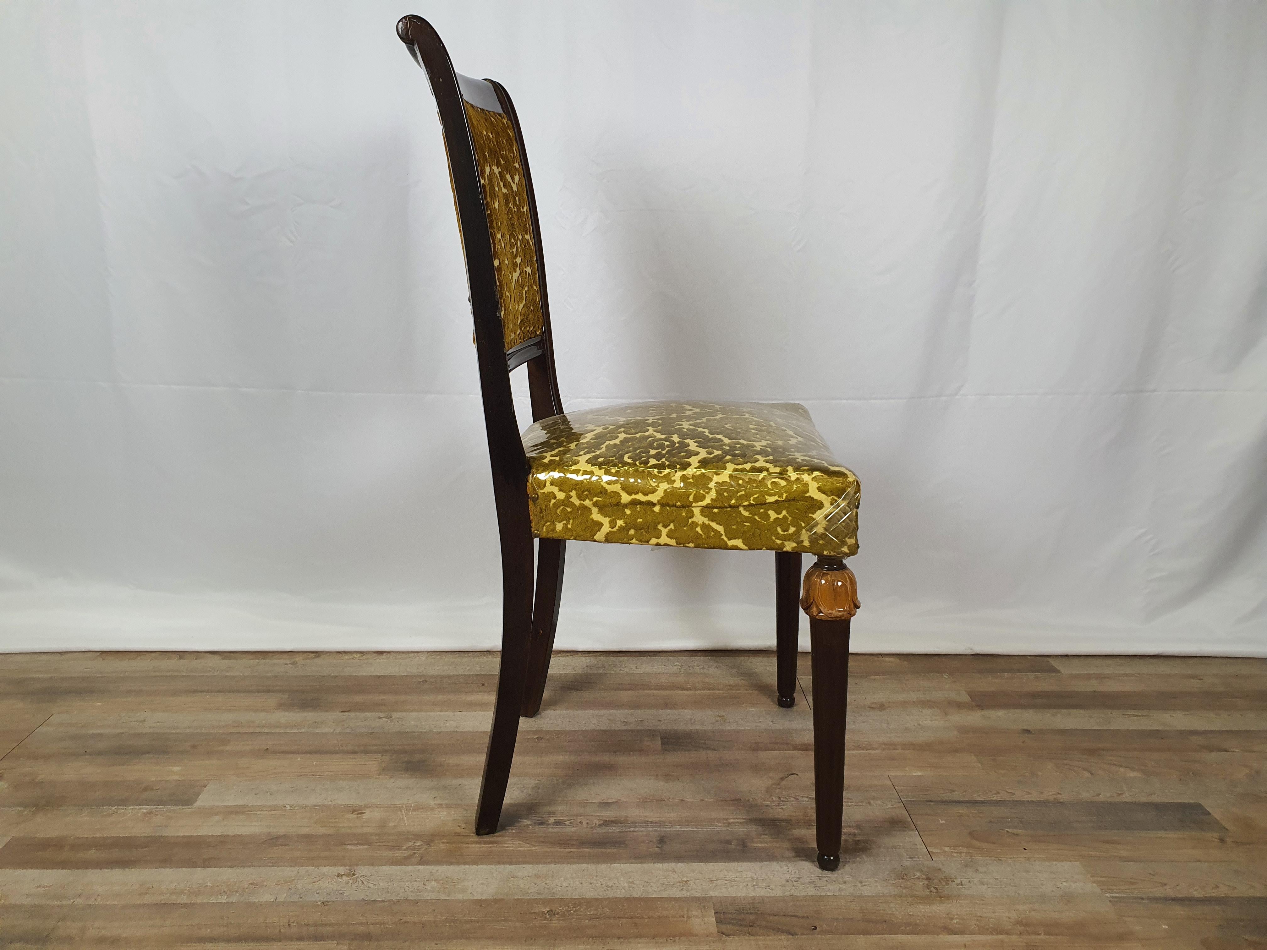 Single chair from the 1950s in wood with backrest and seat in the original fabric of the time.

Shows normal signs of wear, note how little it has been used. The seat is still protected with nylon as seen in the photos.
