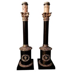 Coppia di lampade da tavolo a colonna in bronzo e ottone in stile impero