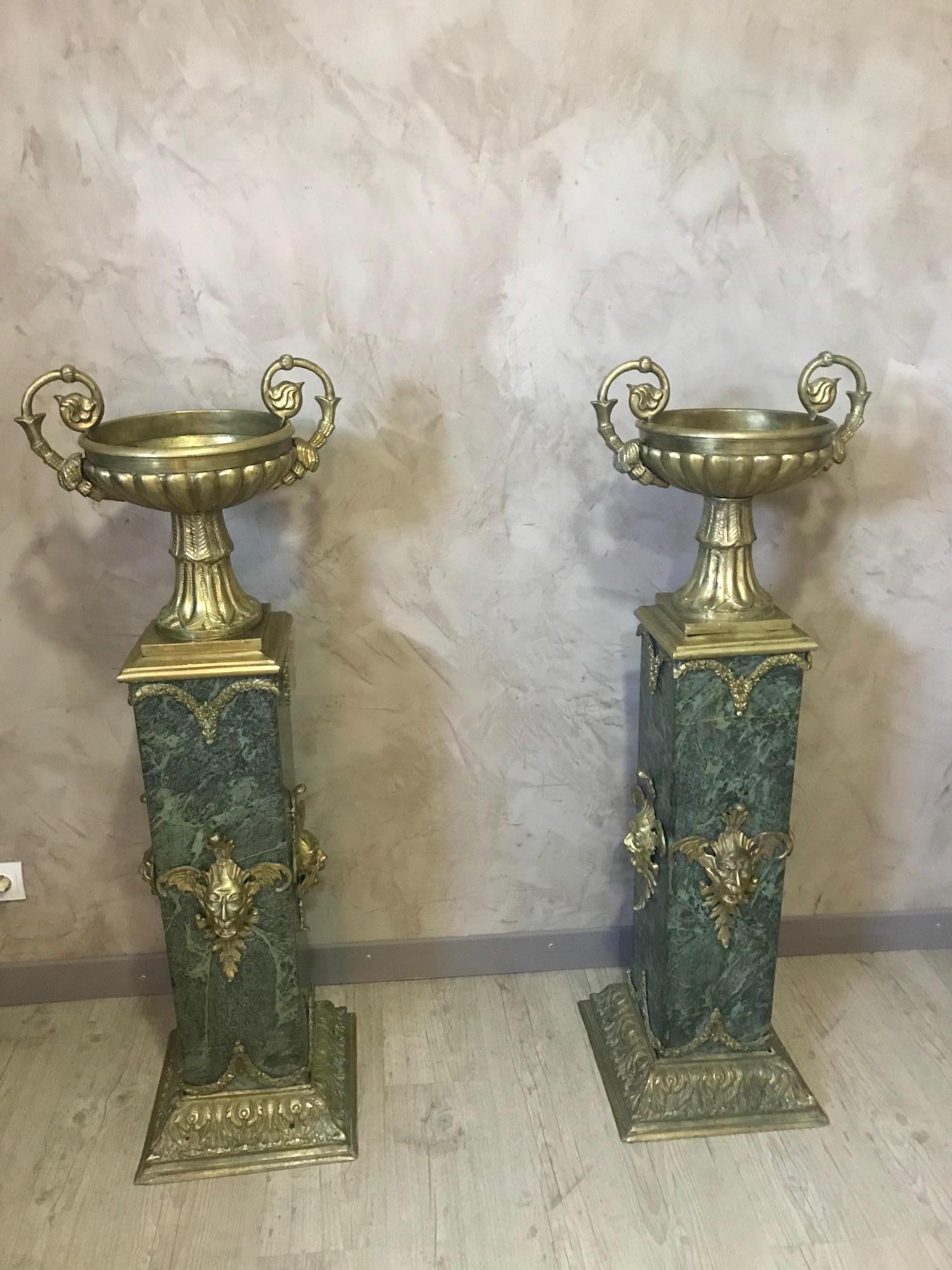 Beautiful and rare Empire style pair of Italian green marble and gilded bronze columns.
Napoleon III period. Bronze Medicis on the top removable thanks to a metal rod.
There are men's head on the green marble.
The base is also gilet bronze. There