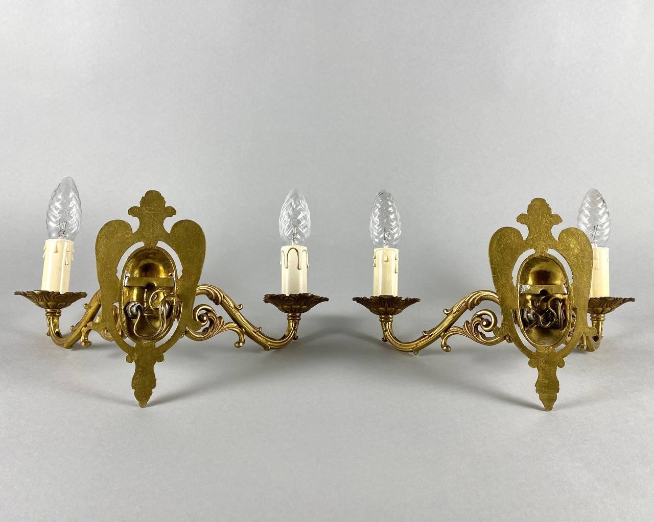 Empire Style Paired Wall Sconces in Gilt Brass Double Arm Wall Lamps In Excellent Condition In Bastogne, BE