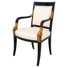 Empire Style Parcel Gilt Ebonized  Wood Armchair