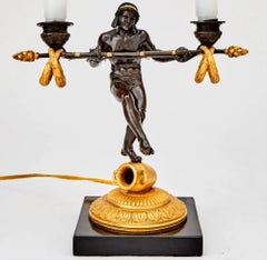 Empire style Patinated and Gilt-Bronze Figural Garniture Set