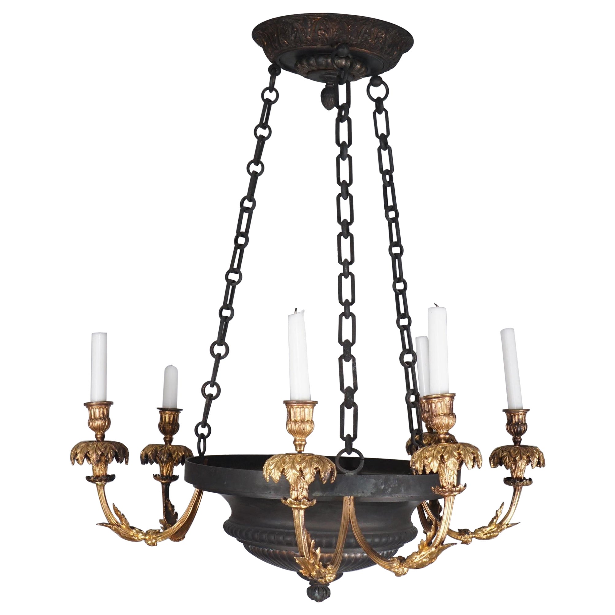 Apparecchio di illuminazione in stile impero in bronzo dorato e patinato