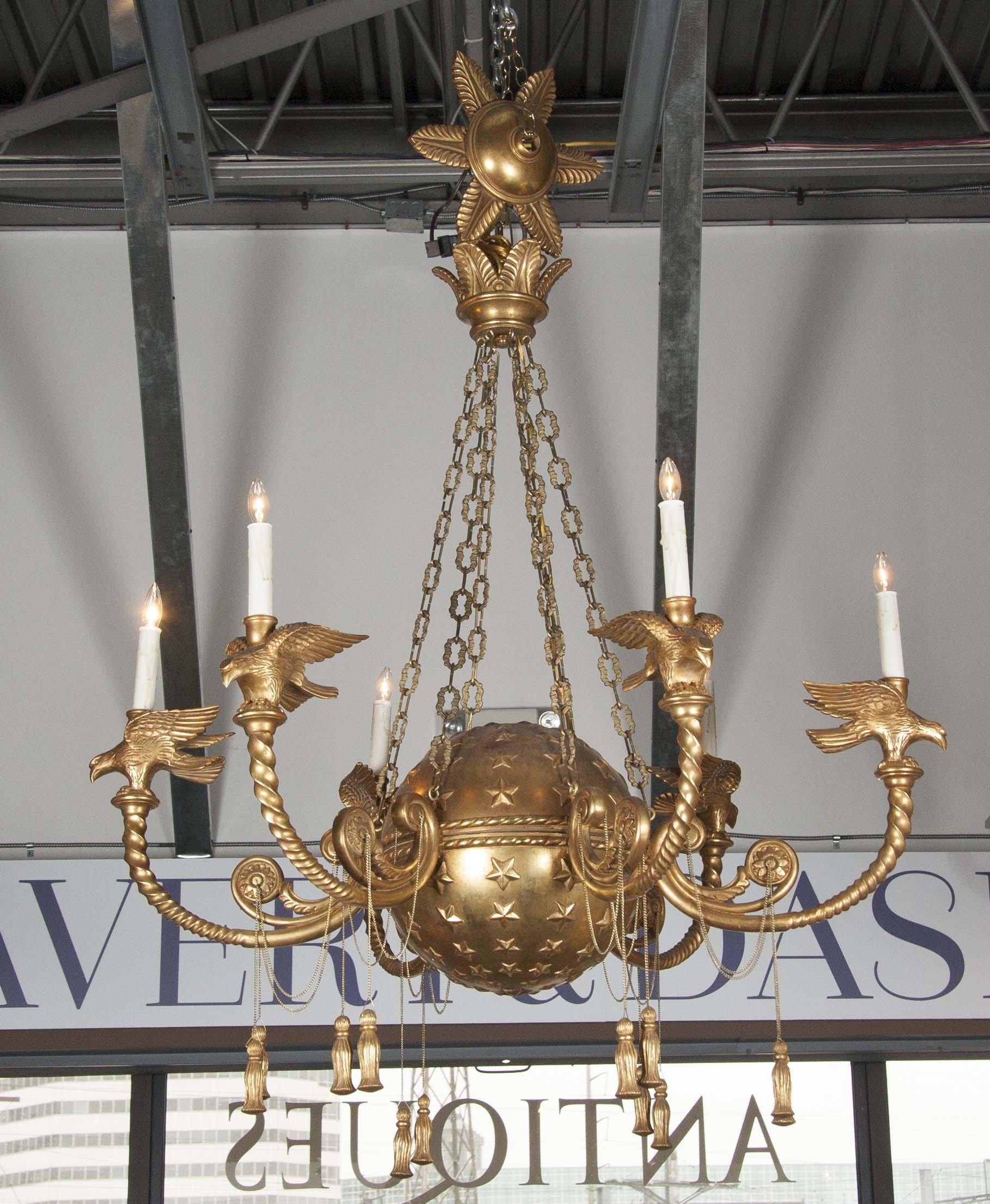 A French Empire style carved gilt chandelier with star relief globe, and eagle arms.




We are proud of our long-standing partnership with George N Antiques who specializes in fine authentic antique furniture and decorative objects of the 18th and