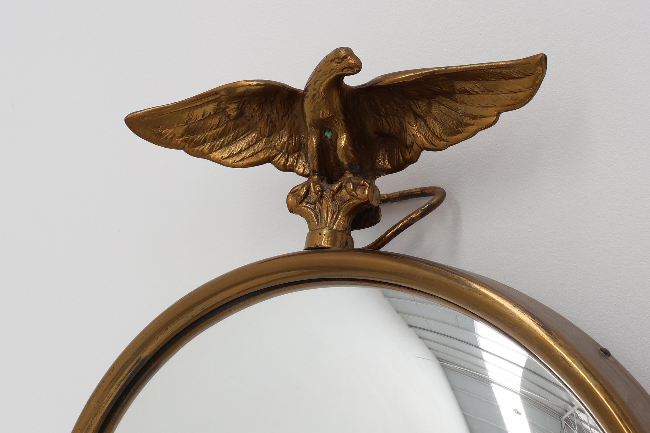 Mid-20th Century Empire style Small Gold Decorative convex Mirror with Eagle, France For Sale