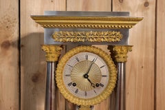 Orologio a colonna in argento massiccio in stile impero