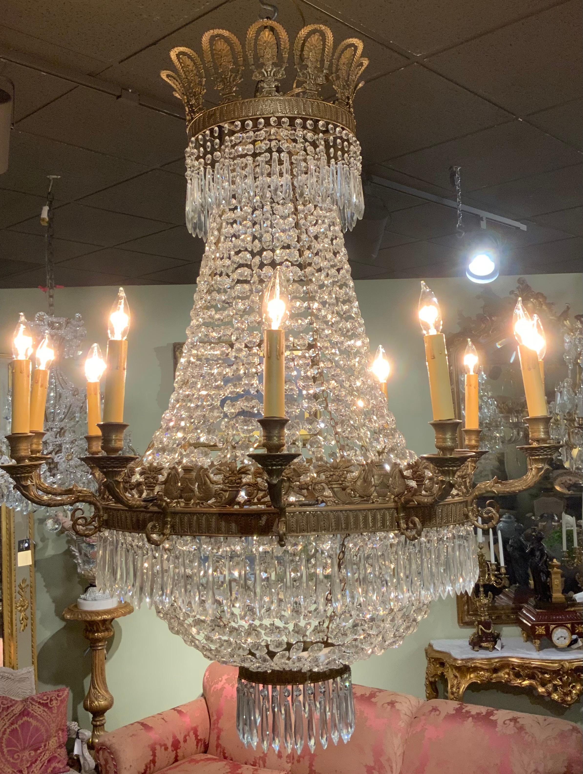 Bronze Empire style twelve light crystal and bronze antique chandelier  For Sale