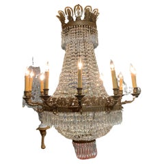 Lustre de style Empire à douze lumières en cristal et bronze antique 