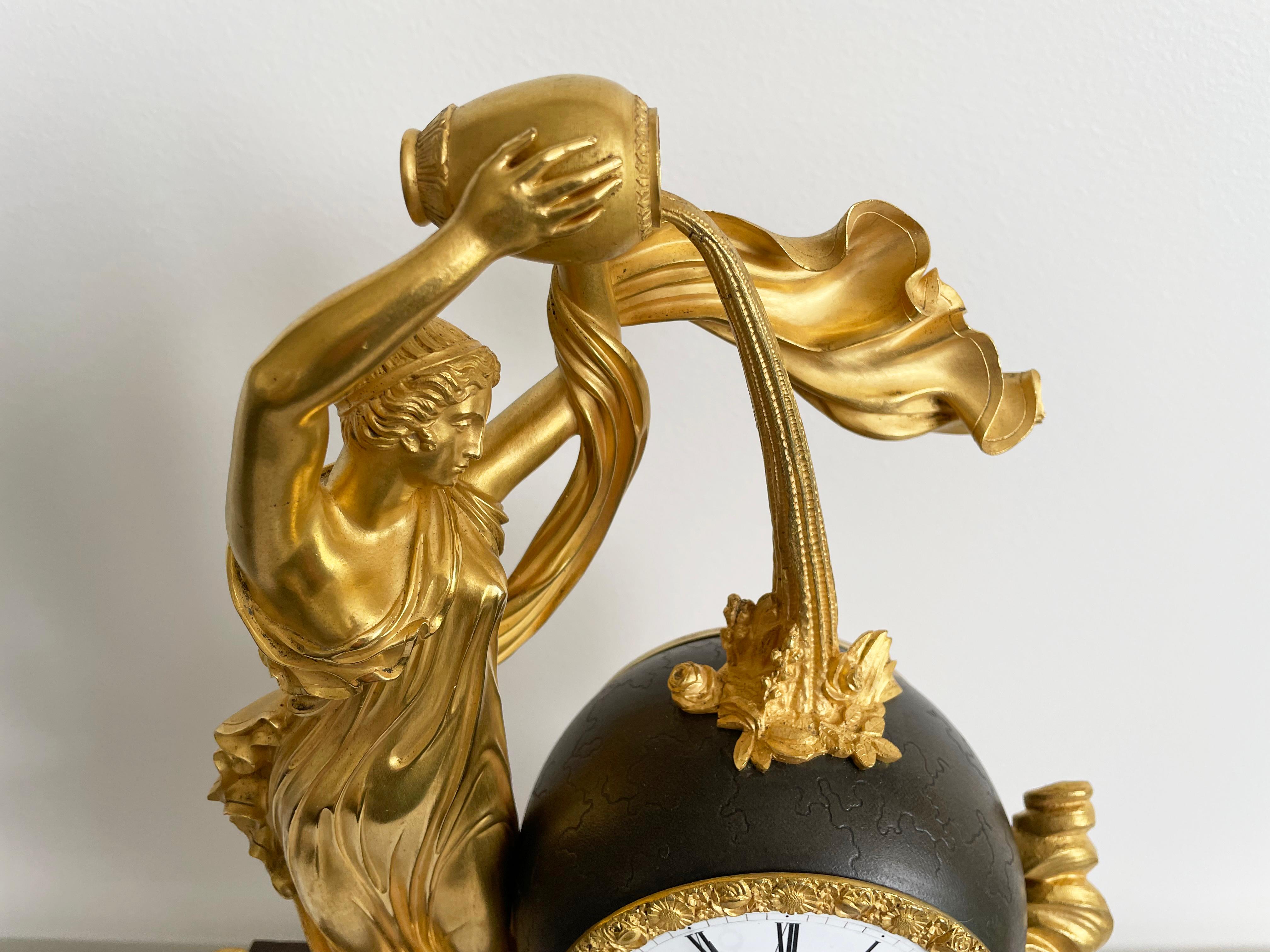 French Empire Table Clock, Patinated and gilded bronze, Cleret, Paris, Circa 1825 For Sale