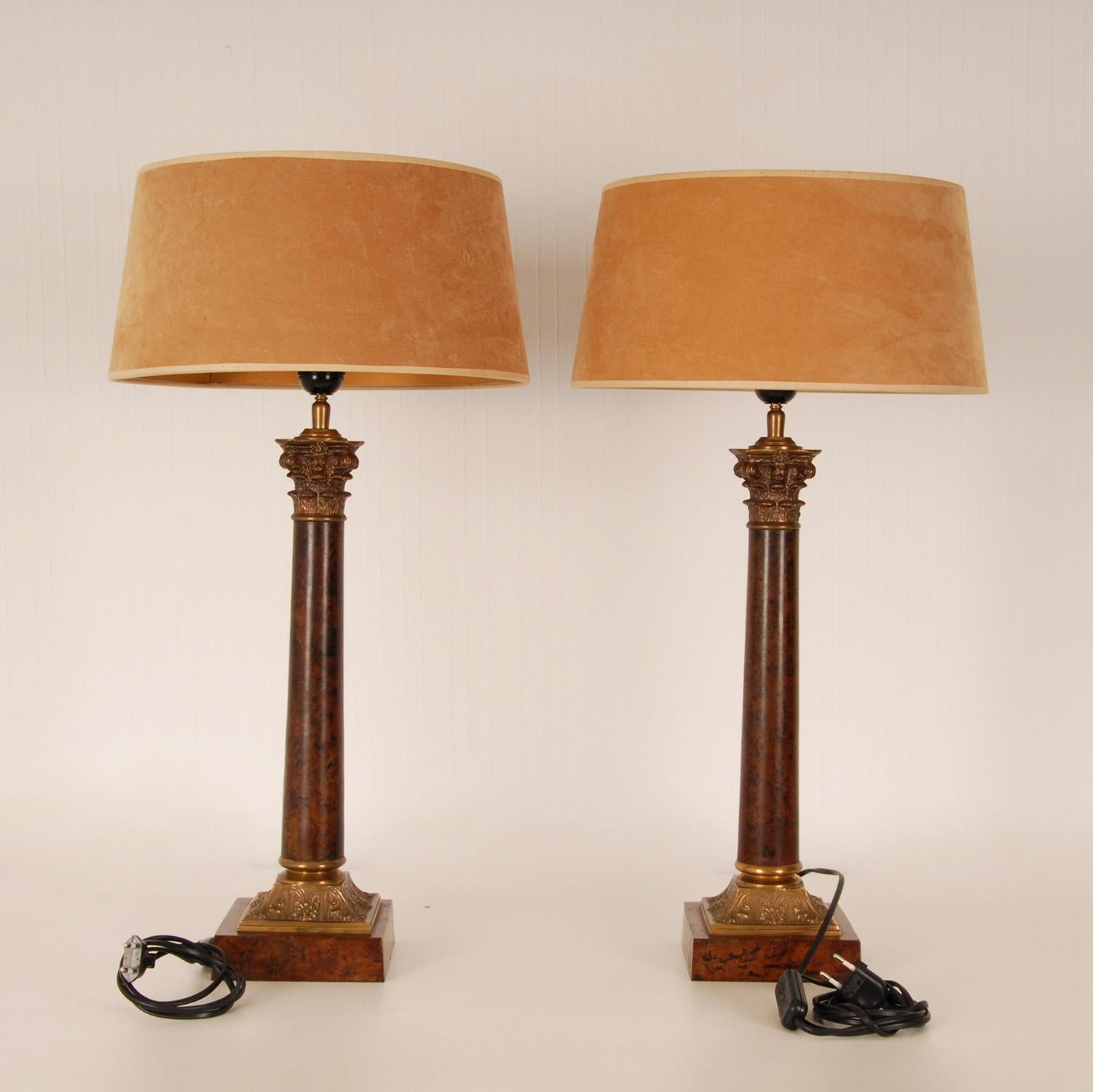 Empire Napoleonic Style Table Lamps 
Patinated and Gilt Bronze and brass Corinthian Column Lamps
Vintage and made in the manner of E.F. Caldwell
Origin France 1970 -1979, Light bulb E27, black cord contains a on - off switch
The lampshades are