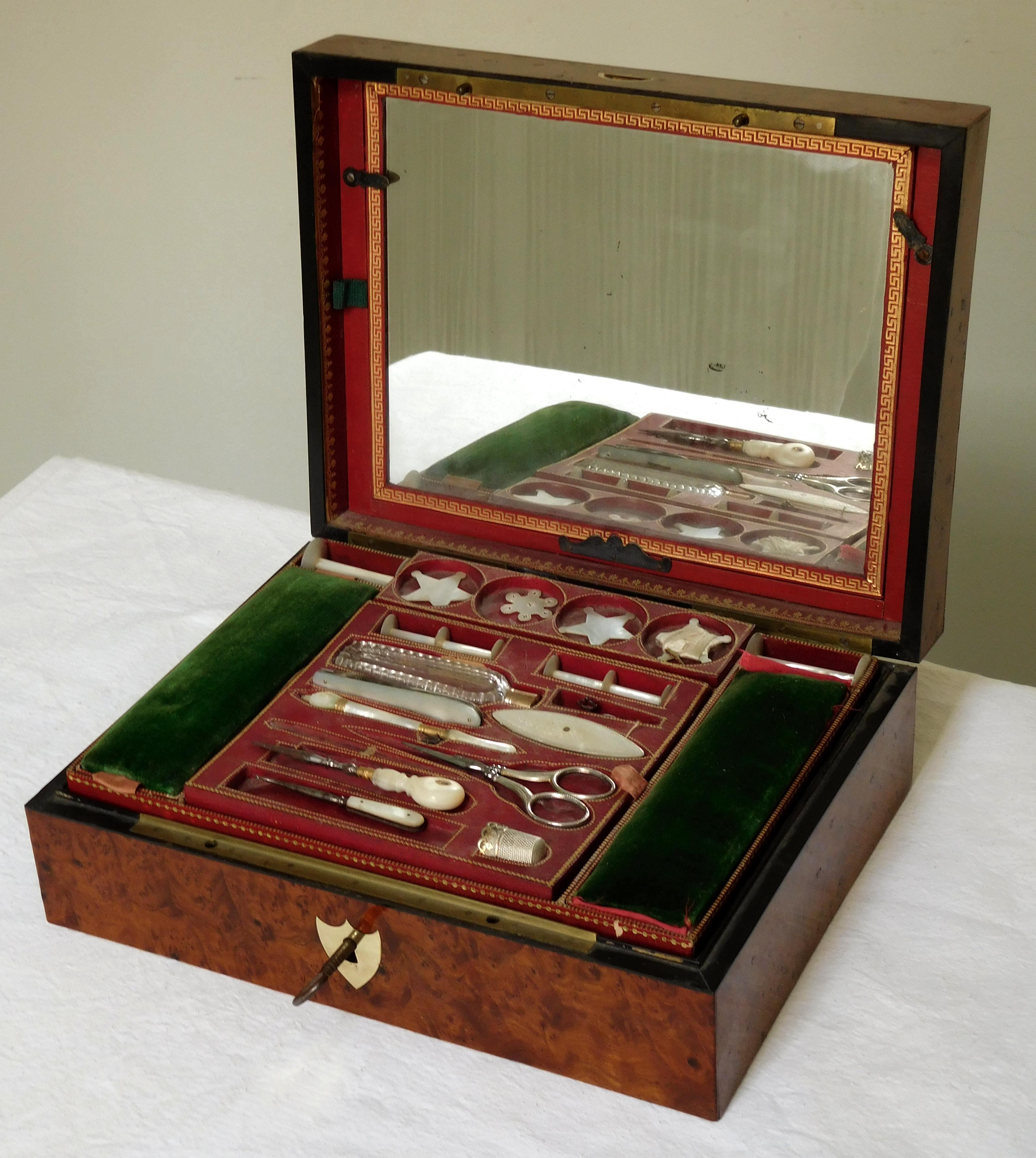 Luxurious travel set for a lady, French early 19th century production - Empire period circa 1815. This travel set is mainly composed of sewing accessories, most of them made of mother of pearl (scissors and thimble are made of sterling silver