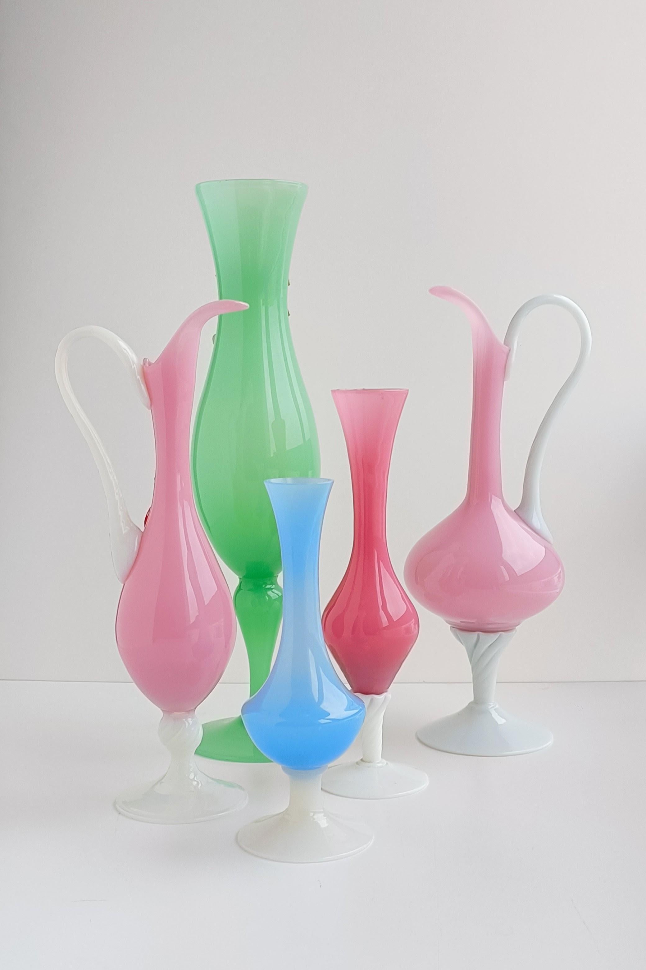 These Empoli Glass Opaline Florence set of Mid Century vases, handcrafted in Italy circa the 1950s, represent a beautiful example of vintage Italian glassware. Empoli, in Tuscany region, Italy, has a long tradition of glassmaking, and the Empoli
