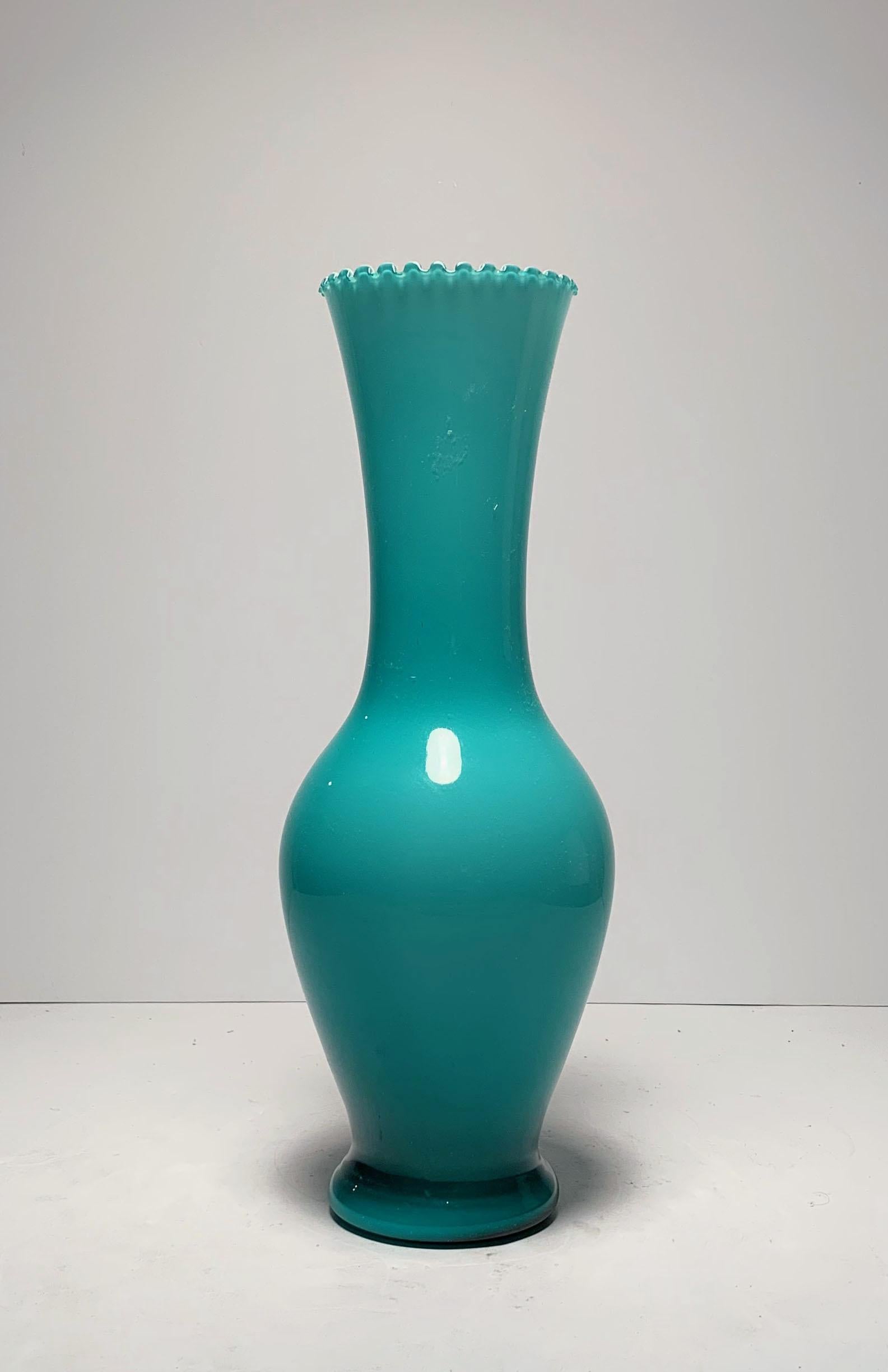 Empoli Italian glass teal blue vase.

 