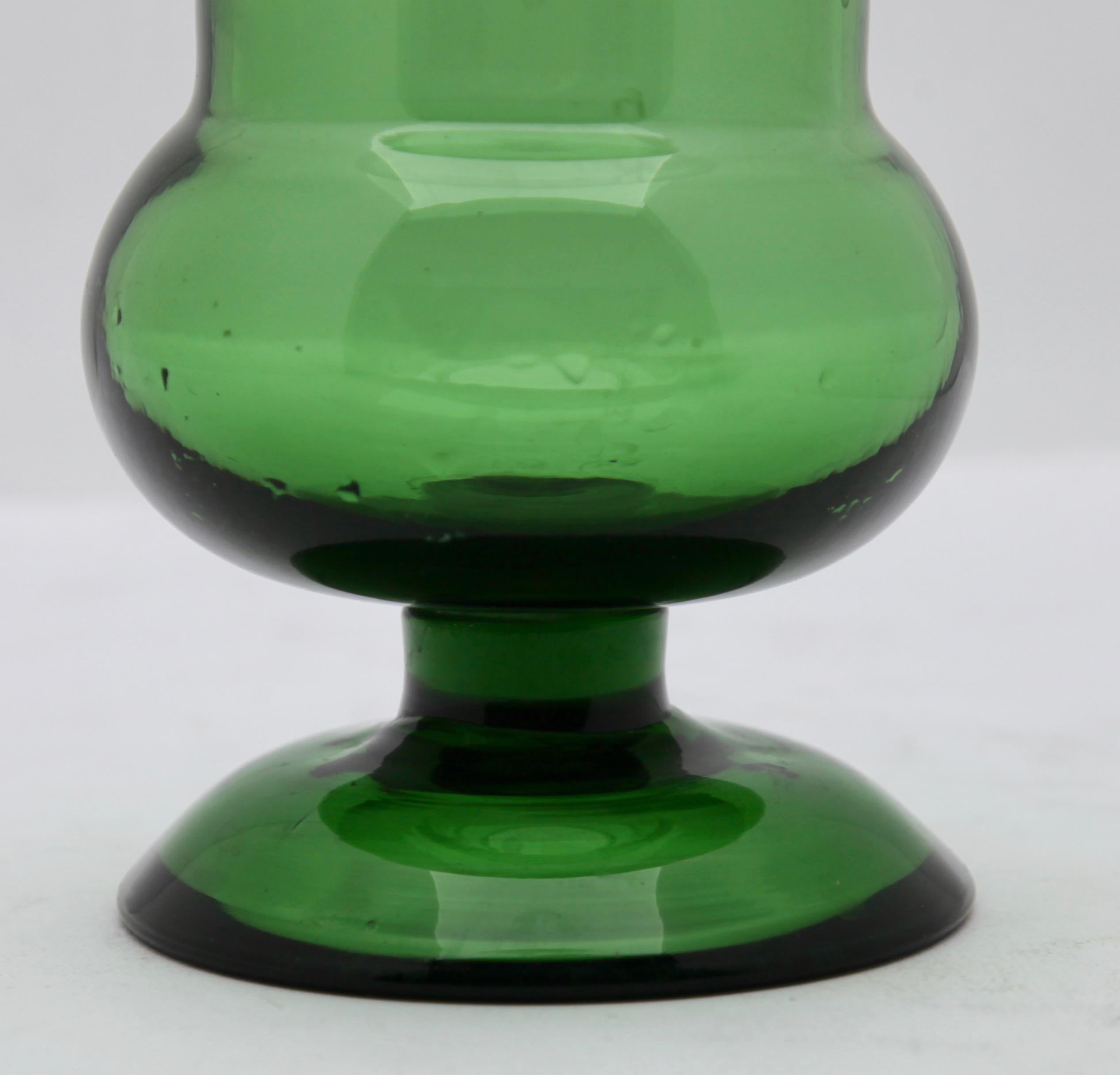 Italian Empoli Verde glass lidded pot in the style of an apothecary jar from the mid-20th century. Unusual design. Excellent condition.
The piece is in excellent condition and a real beauty!

We specialise in Art Nouveau, Art Deco and Vintage