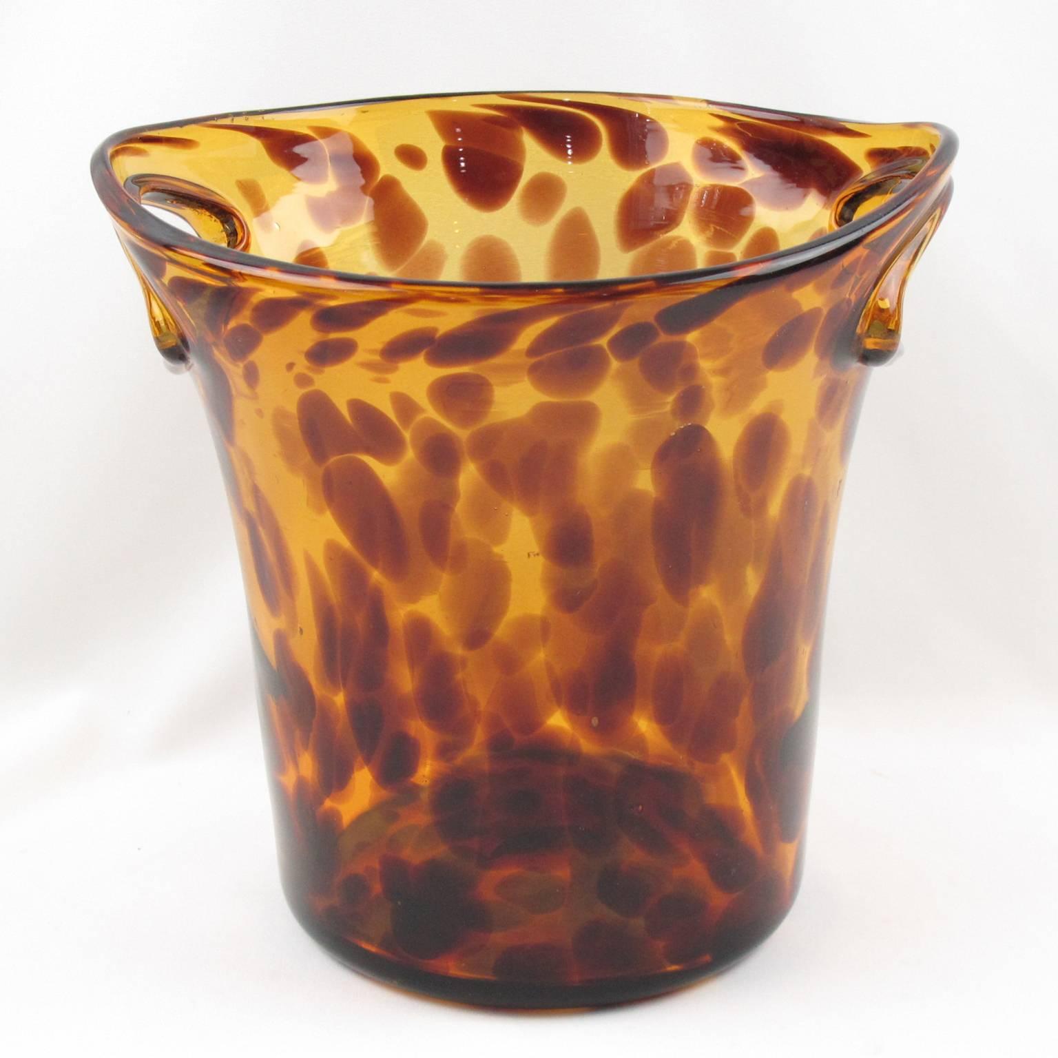 1960s French designer Christian Dior glass champagne cooler or wine cooler or ice bucket. From the Dior Home collection, mouth-blown in Empoli, Italy. Exclusive tortoise shell color flowing pattern. Polished pontil mark on the bottom. 
Measurements: