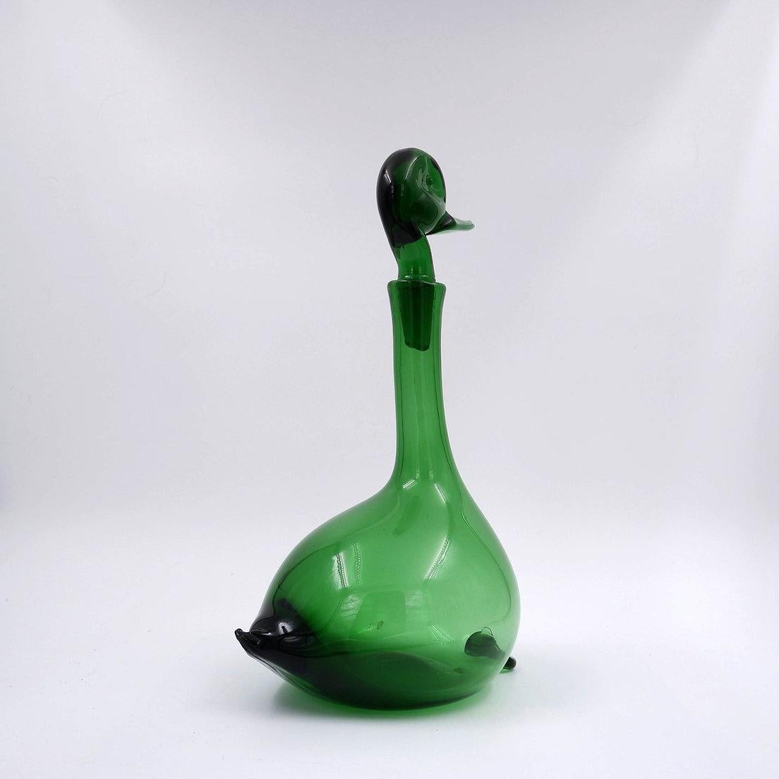 Decanter per anatre Empoli Verde attribuito a Gio Ponti per Toso Bagnoli
Decanter per vino Gio Ponti Duck
Mesaures : 14cmx23cm H. 34,5cm 
Materiale:  Vetro 

Usura coerente con l'età e l'uso.