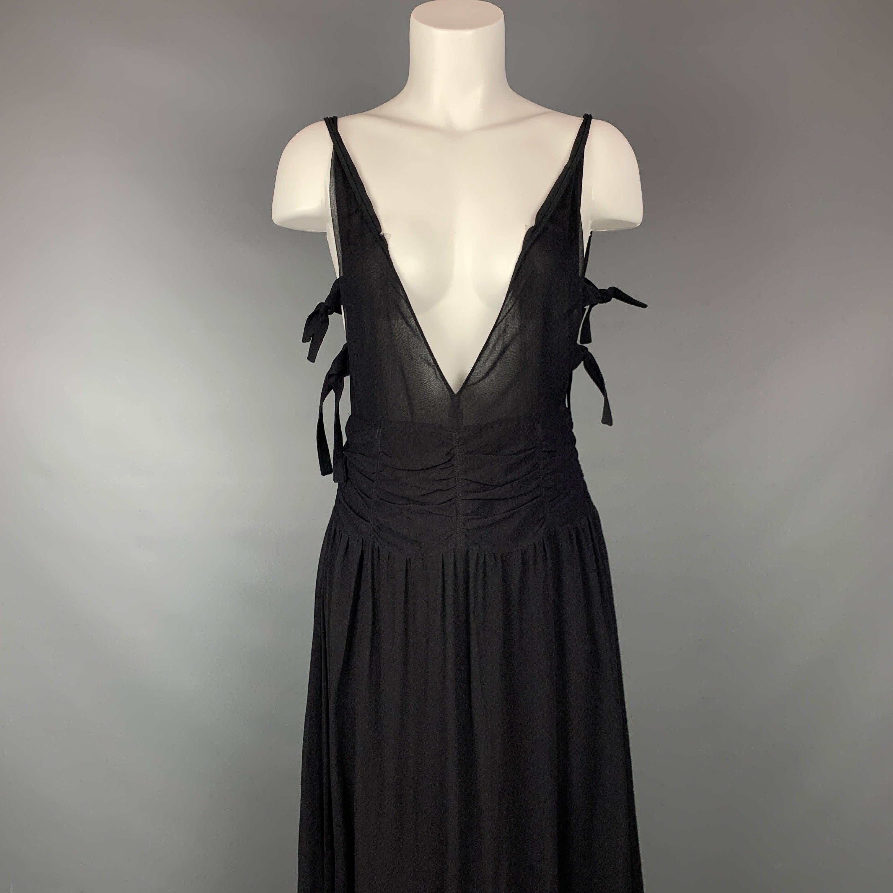 EMPORIO ARMANI 2002 gown comes in a black chiffon material featuring an a-line style, ruched design, side tie details, plunging v-neck, and a back zip up closure.
Made in Italy. Very Good
Pre-Owned Condition. 

Marked:  42 

Measurements: 
 Bust: 28