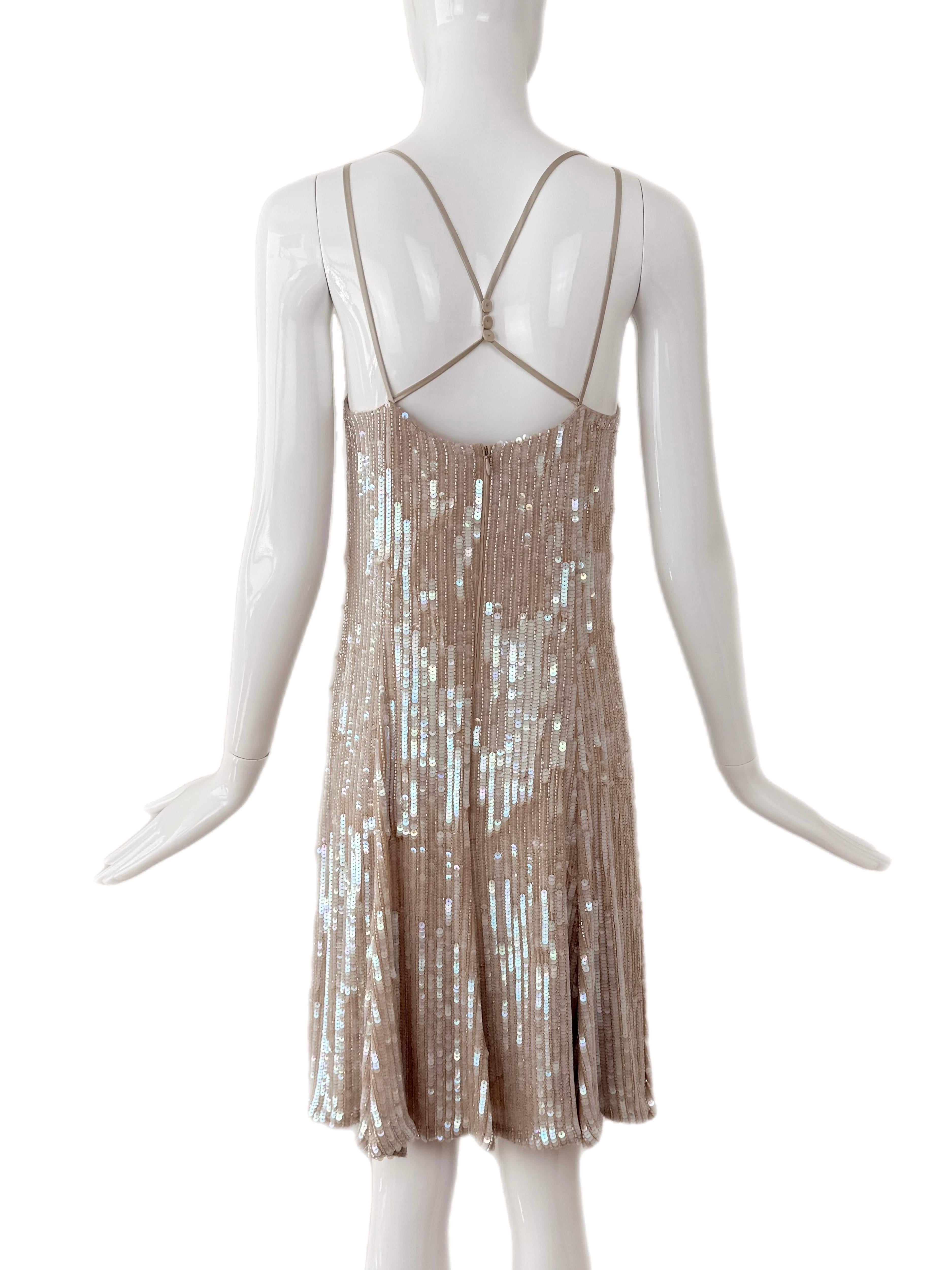 Emporio Armani (listed under Giorgio because Emporio wasn't an option)
Vintage
2007
Ethereal !!! Glistens like crazy even without flash / light
Nude background with clear iridescent sequins
Mix of warm and cool tones
Micro buttons on straps
Back