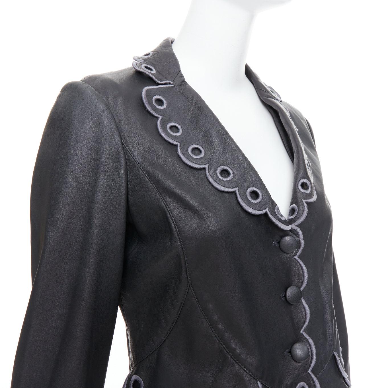 EMPORIO ARMANI 2009 black lambskin grey embroidered scalloped trim crop jacket IT40 S
Reference: CNLE/A00375
Brand: Emporio Armani
Collection: 2009
Material: Lambskin Leather
Color: Grey, Black
Pattern: Solid
Closure: Button
Lining: Black