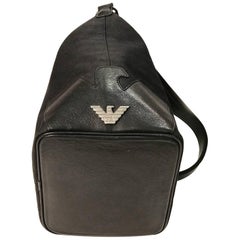 Emporio Armani black canvas with monogram pattern shoulder bag.