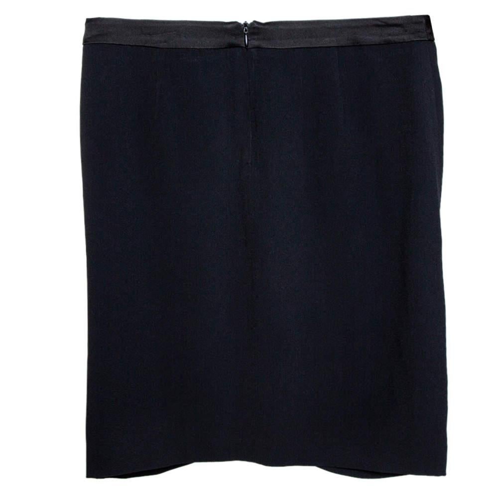 Pair this Emporio Armani skirt with favourite top and step out in a chic and elegant look. An excellent fusion of splendour and style is this high-class black, crepe skirt, enhanced with a draped silhouette and knot accent.