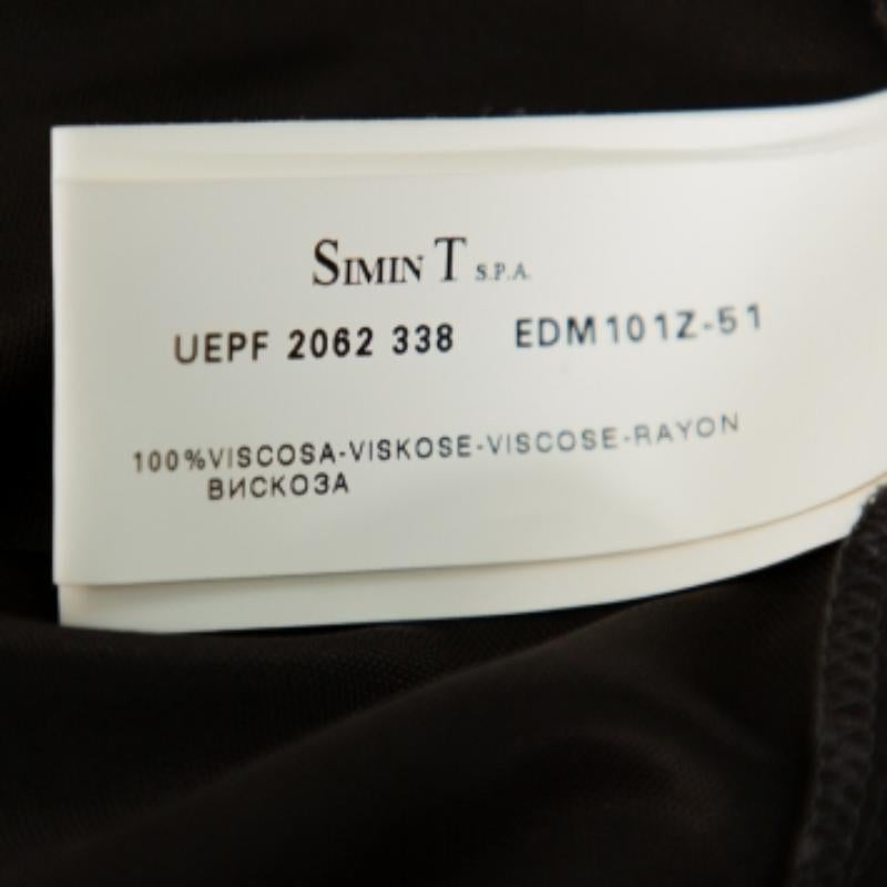 This top by Emporio Armani skillfully merges elegant drapes and folds with a casual, oversized silhouette. The black women's top has a comfortable fit and a design that will look great with both pants and skirts.