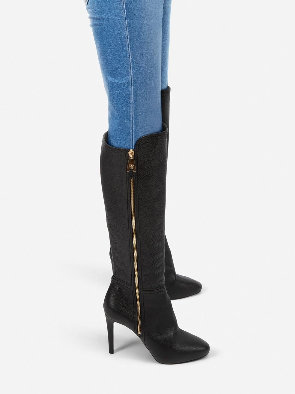 CONDITION is Very good. Minimal wear to the boots is evident. Abrasion on the right side of the left shoe, left side of the right shoe, toe box, counter and heel on both shoes on this used Emporio Armani designer resale item.
 
 Details
 
 
