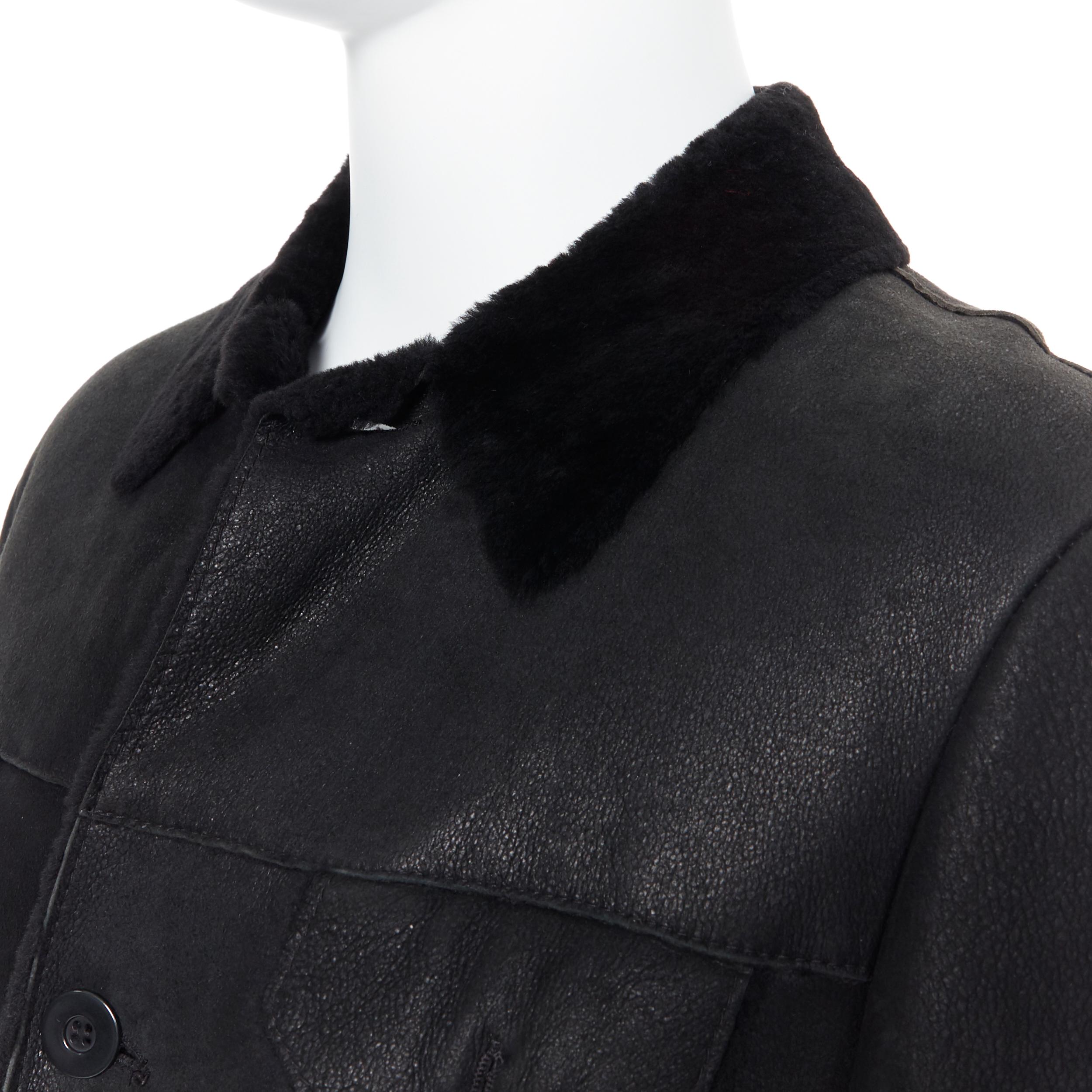EMPORIO ARMANI black leather shearling lined 4-pocket aviator winter coat EU50 L
Brand: Emporio Armani
Model Name / Style: Shearling jacket
Material: Leather
Color: Black
Pattern: Solid
Closure: Button
Extra Detail: Long sleeve. Collared neckline.