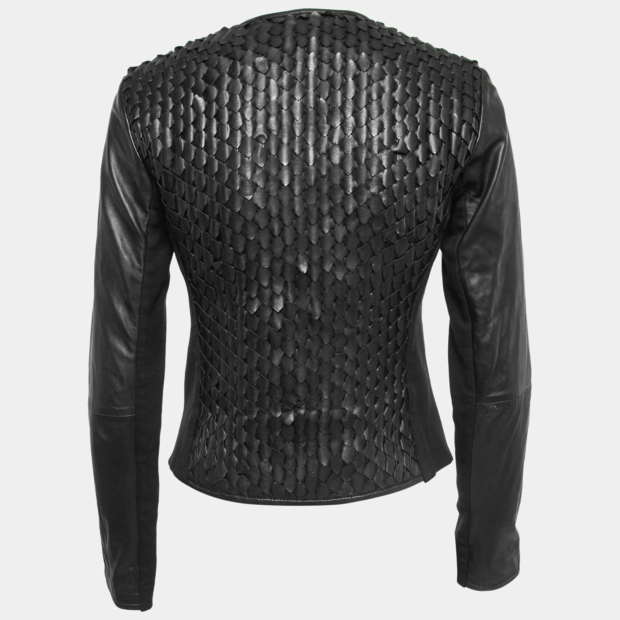 An elegant silhouette, smart fit, and perfect tailoring make this Emporio Armani leather jacket a fine choice. It is made of quality materials and secured with a front zip closure.

