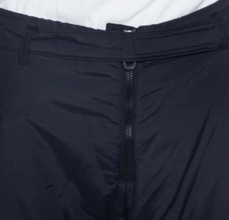 Everything about these Emporio Armani's pants speaks comfort and ease. They have been crafted in a loose silhouette and are detailed with a zip fastening. Wear them with a camisole and slides for a relaxed ensemble.