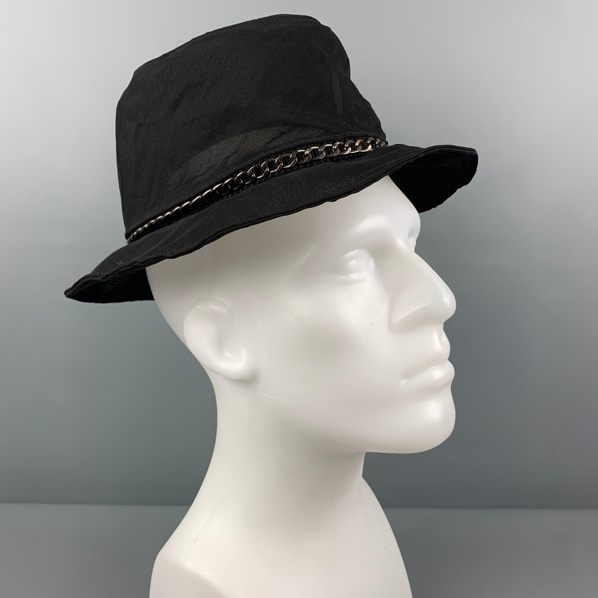 EMPORIO ARMANI bucket hat comes in a black see through silk featuring a chain link detail. Made in Italy.
New With Tags. 

Marked:   56 

Measurements: 
  Opening: 22 inches  Brim: 2.5 inches  Height: 3.75 inches 
  
  
 
Reference: 120517
Category: