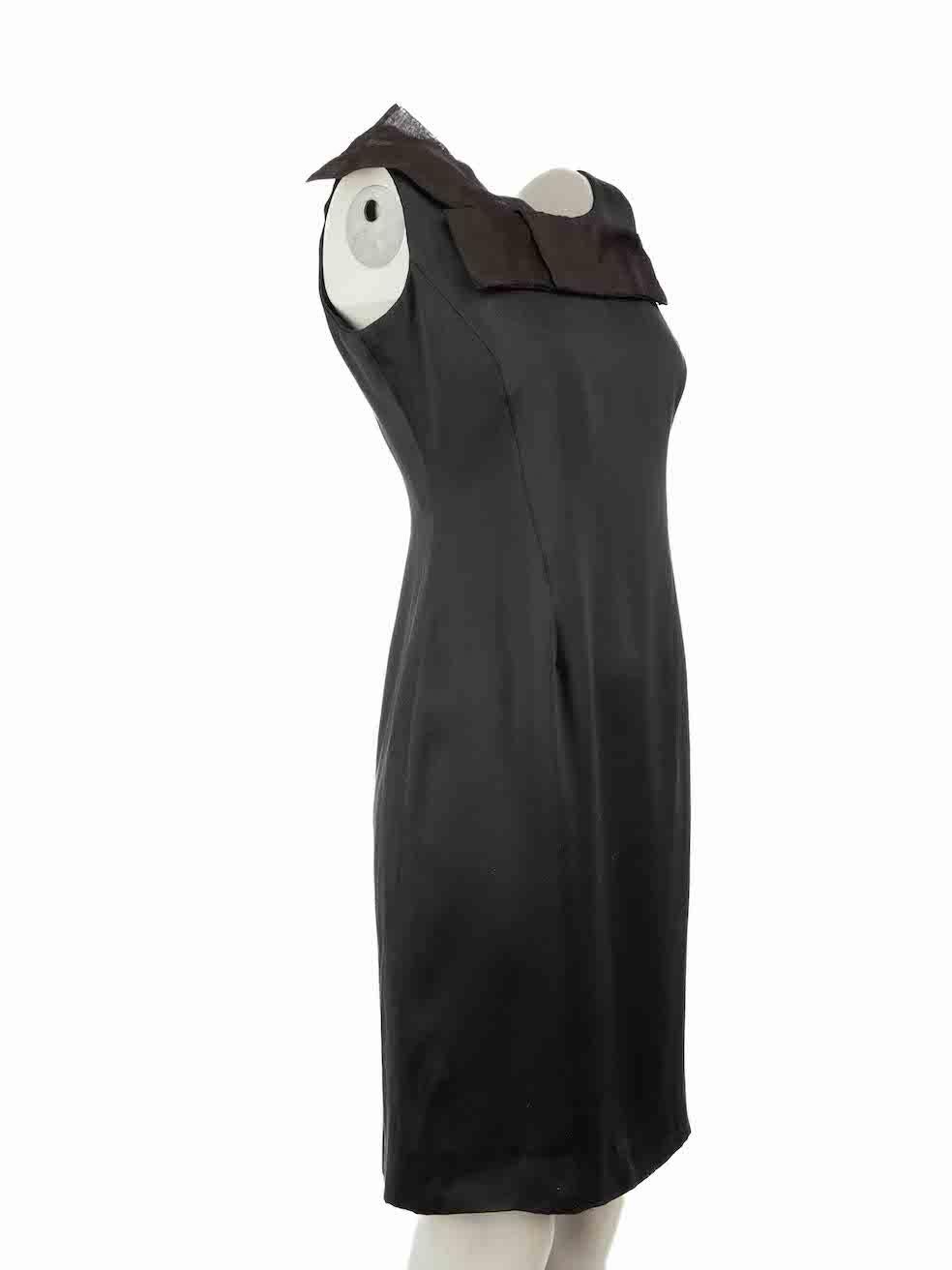 CONDITION is Very good. Hardly any visible wear to dress is evident on this used Giorgio Armani designer resale item.
 
 Details
 Black
 Silk
 Dress
 Figure hugging fit
 Sleeveless
 Round neck
 Mini
 Front bow detail
 Back zip fastening
 
 Made in