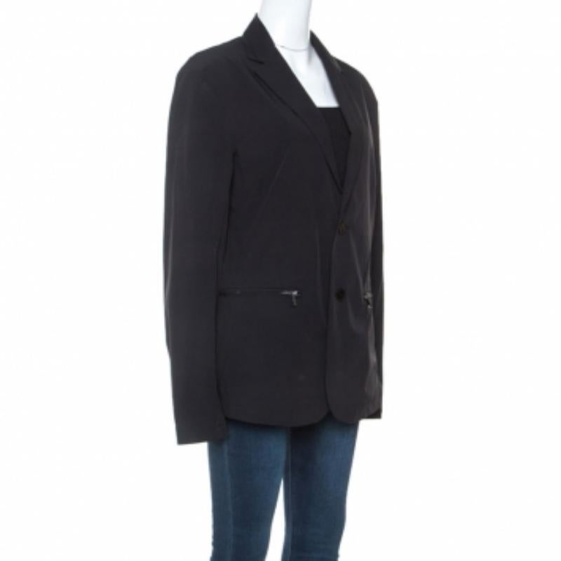 A blazer as finely tailored as this one from Emporio Armani deserves to be in your closet. It has been made from stretch nylon and it comes in black with zipped pockets and buttons on the front.