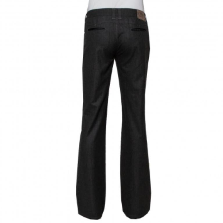 You'd definitely want to be seen wearing this pair from Emporio Armani! Finely made from fabric, this creation comes in black. It has a striped exterior, a straight leg silhouette, belt loops on the waistband, five pockets and zip closure.