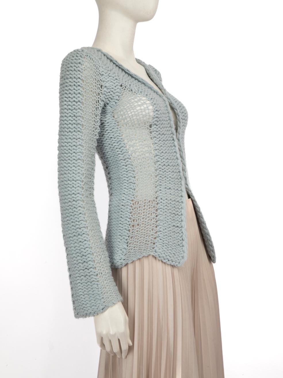CONDITION is Very good. Minimal wear to the cardigan is evident. Pluck to the weave on the front right. Discolouration on the right sleeve on this used Emporio Armani designer resale item. Discolouration may need gentle hand wash contrary to dry