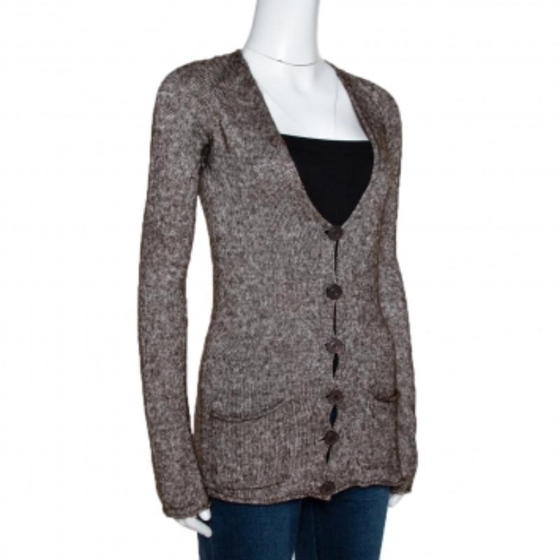This cardigan from Emporio Armani is here to make you look fashionably divine. Made from quality materials, the comfortable cardigan in brown has long sleeves, button closure and pockets at the front. It is sure to be a loved buy.
