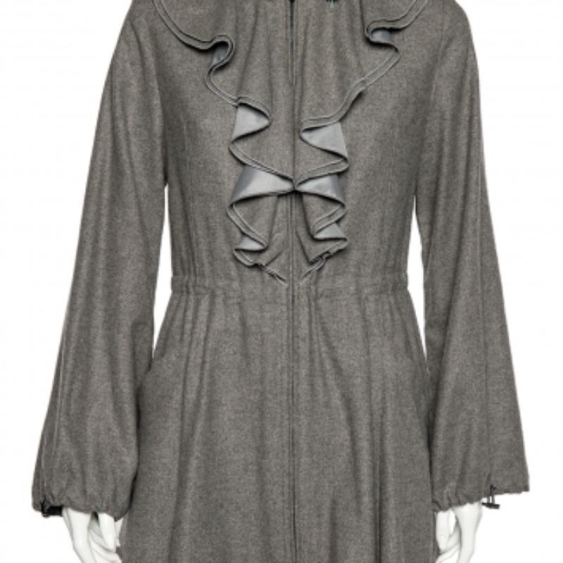 Designed by the House of Emporio Armani, this coat leaves an imprint on your mind with its skilled tailoring. This coat proves to be a great choice for the winter. It is stitched using grey wool and cashmere with a ruffled neck detail, zip-front,